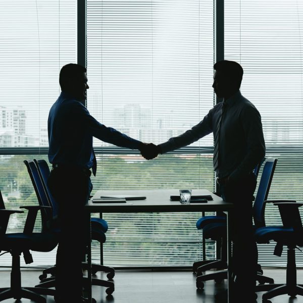 Greeting Business executives shaking hands to greet each other